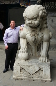They say everything is bigger in Texas. It's even bigger in Beijing. Here I am with one of the campus' lions.