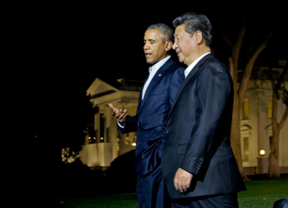 Presidents Obama and Xi walk from the White House to Blair House for dinner on Sept. 24.